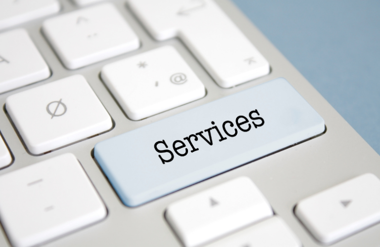 Part of a keyboard showing Services instead of Enter